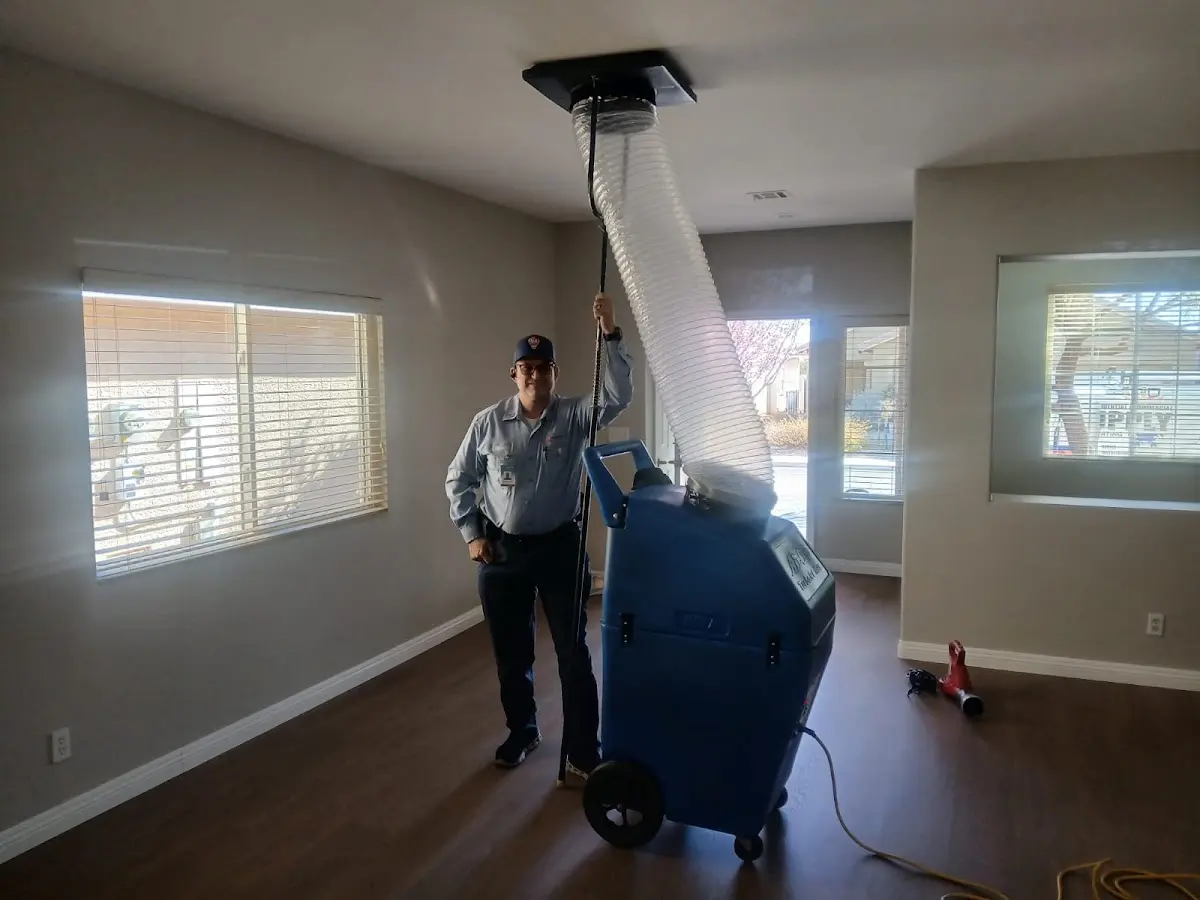 Professional Dryer Vent Cleaning work inside a La Quinta home